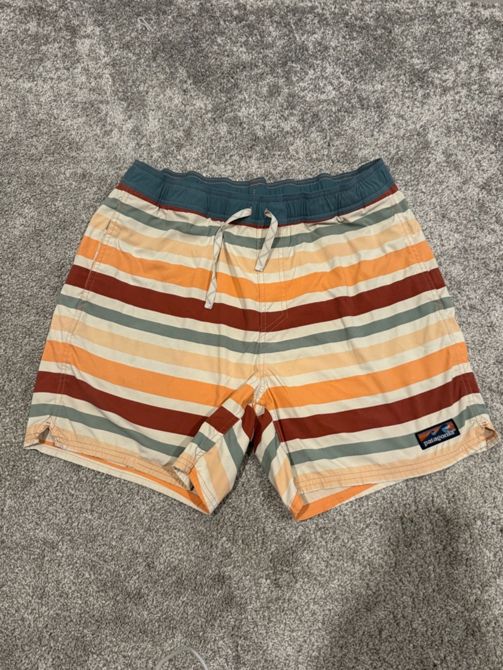 Patagonia | Men’s Striped Board Shorts in Teal, Rust, Yellow